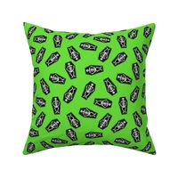 skeletons fabric - coffin halloween design - lime