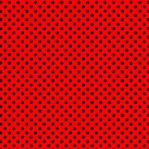 skull polka dots black on red