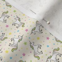 Rainbow Unicorns and Stars, scattered on ivory – small scale