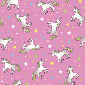 Rainbow Unicorns and Stars, scattered on candy pink – medium scale