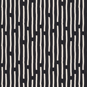 Creamy  vertical lines on dark charcoal