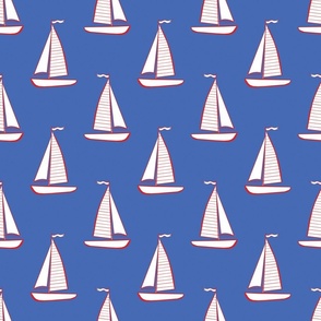 Red white and blue summer sailboats 