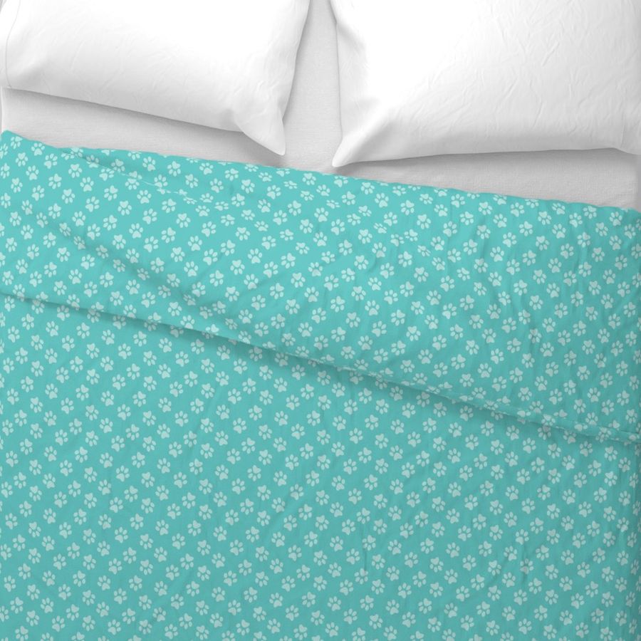 Paw print lt blue on teal