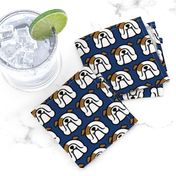 English Bulldog faces fabric on dark blue 