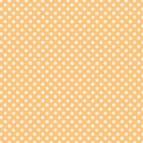 skull polka dots white on pastel orange