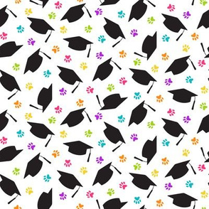 Tossed Graduation Caps with Rainbow Paw Prints 