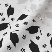 Tossed Graduation Caps with Paw Prints in Black on White