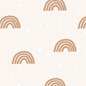 Rainbows nursery wallpaper in boho cinnamon scroll brown