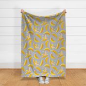 Normal scale // Paper cut geo bananas // grey background yellow geometric fruits