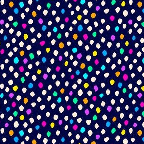 Cream and bright rainbow spots on navy