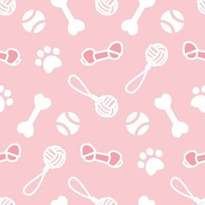 Small scale // Fetch play and chew // pastel pink background white bones balls pet toys and paw prints