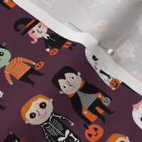 trick or treat - cute halloween kids in costumes fabric - dark purple