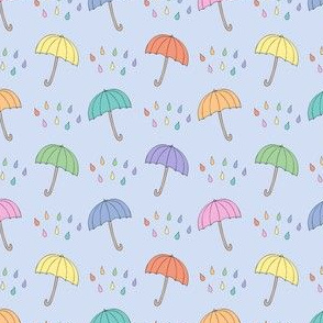 Light rainbow umbrellas and raindrops on blue (small)