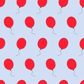 Red balloons, blue sky