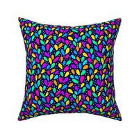 Neon rainbow bright leaves with cream spots on navy