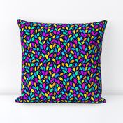 Neon rainbow bright leaves with cream spots on navy