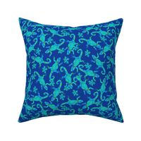 Bright blue and green geckos on blue small