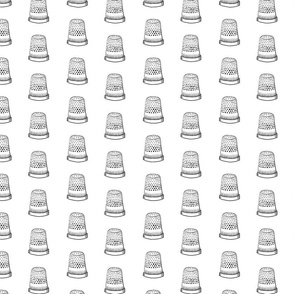 Thimbles on White Sewing Notions Thimble 