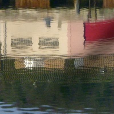 Reflections in Red at a Quiet Port