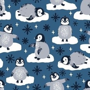 Cute penguins. Dark blue background