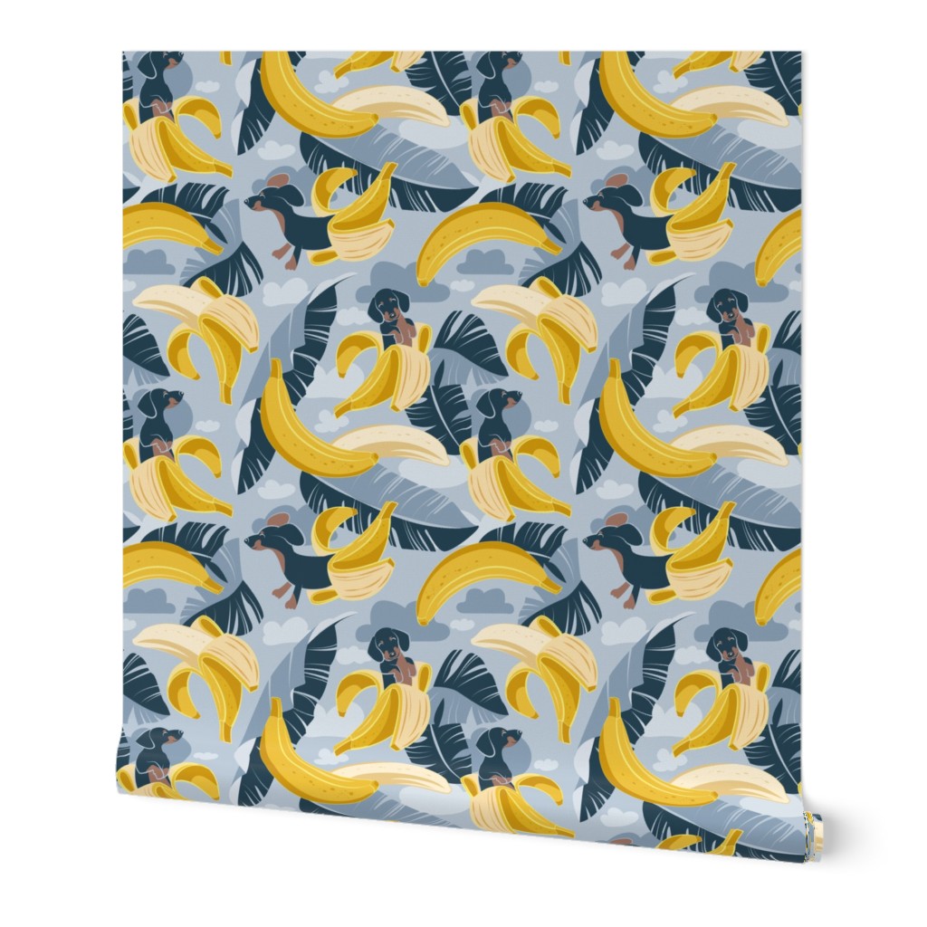 Small scale // Surrealistic tropical Dachshund bananas // pastel blue background navy blue dogs and banana fruit leaves