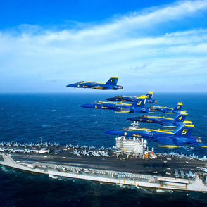  62-24  Blue Angels fly in the Delta Formation over the aircraft carrier USS George H.W. Bush