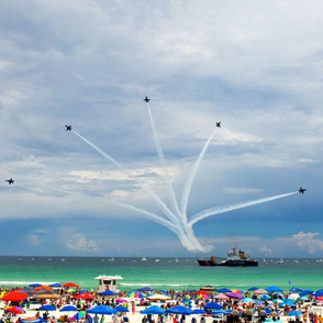 63-10 Blue Angels, Delta pilots perform the Delta Break Out over the Gulf of Mexico during the Pensacola Beach Air Show