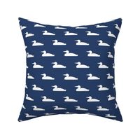 Small abstract loon silhouette - white on navy