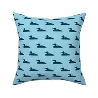 Small abstract loon silhouette - navy on light blue