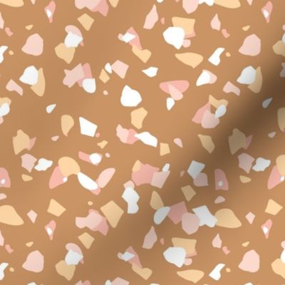 Terrazzo messy confetti abstract paper cut shapes trendy nursery design neutral brown orange pink