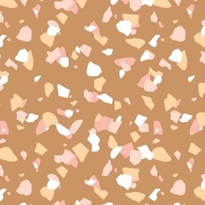 Terrazzo messy confetti abstract paper cut shapes trendy nursery design neutral brown orange pink