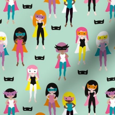 Colorful super hero girls with mask and cape fun heroine theme for kids mint