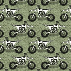 Small scale // Motocross // monochromatic sage green background and motorcycles 