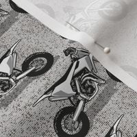 Small scale // Motocross // monochromatic grey background and motorcycles 