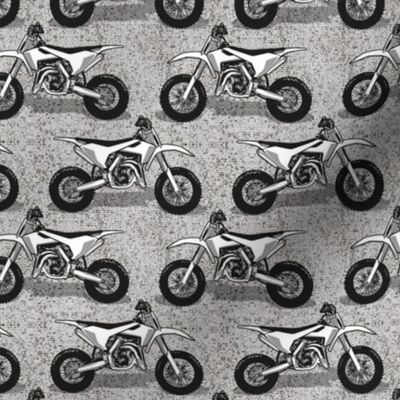 Small scale // Motocross // monochromatic grey background and motorcycles 