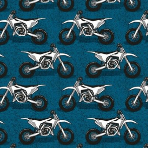 Small scale // Motocross // dark teal background black white and grey motorcycles