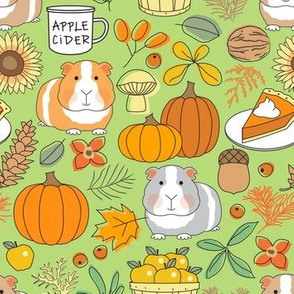 friendly fall guinea pigs on green