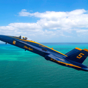 64-23 The Blue Angels, lead solo pilot Lt. Cmdr. Brandon Hempler performs the Section High Alpha maneuver over Miami