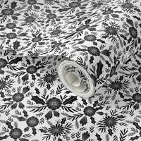 christmas woodcut botanical fabric - block print holiday design - white and black