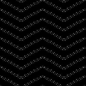 Black and White Zig Zag Stripes with Dots on Black Background