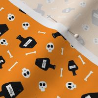 Skulls and Bottles of Poison on Halloween Orange