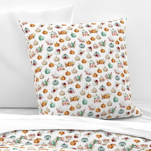 small floral pumpkins on white