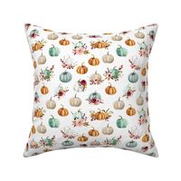 small floral pumpkins on white