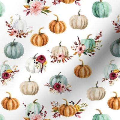 small floral pumpkins on white