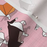 Small scale // Origami Collie friends // pastel pink linen texture background white orange & brown paper and cardboard dogs