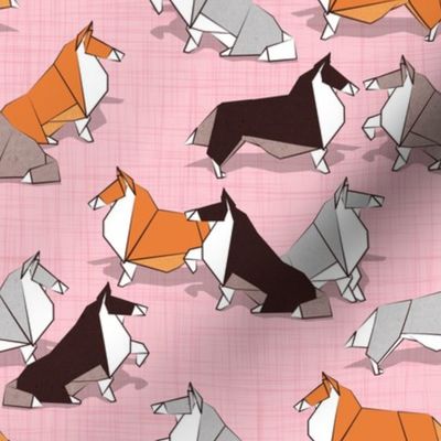 Small scale // Origami Collie friends // pastel pink linen texture background white orange & brown paper and cardboard dogs