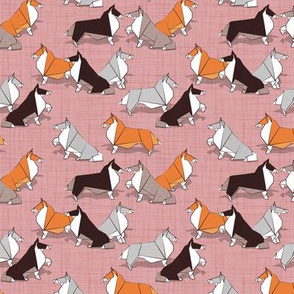 Tiny scale // Origami Collie friends // blush pink linen texture background white orange & brown paper and cardboard dogs