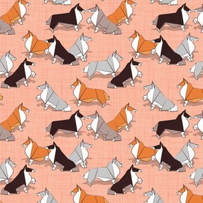 Tiny scale // Origami Collie friends // flesh coral linen texture background white orange & brown paper and cardboard dogs