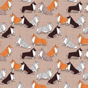 Tiny scale // Origami Collie friends // brown linen texture background white orange & brown paper and cardboard dogs