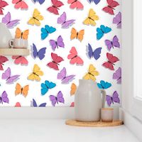 Rainbow Butterflies on White Background © Jennifer Garrett 2022